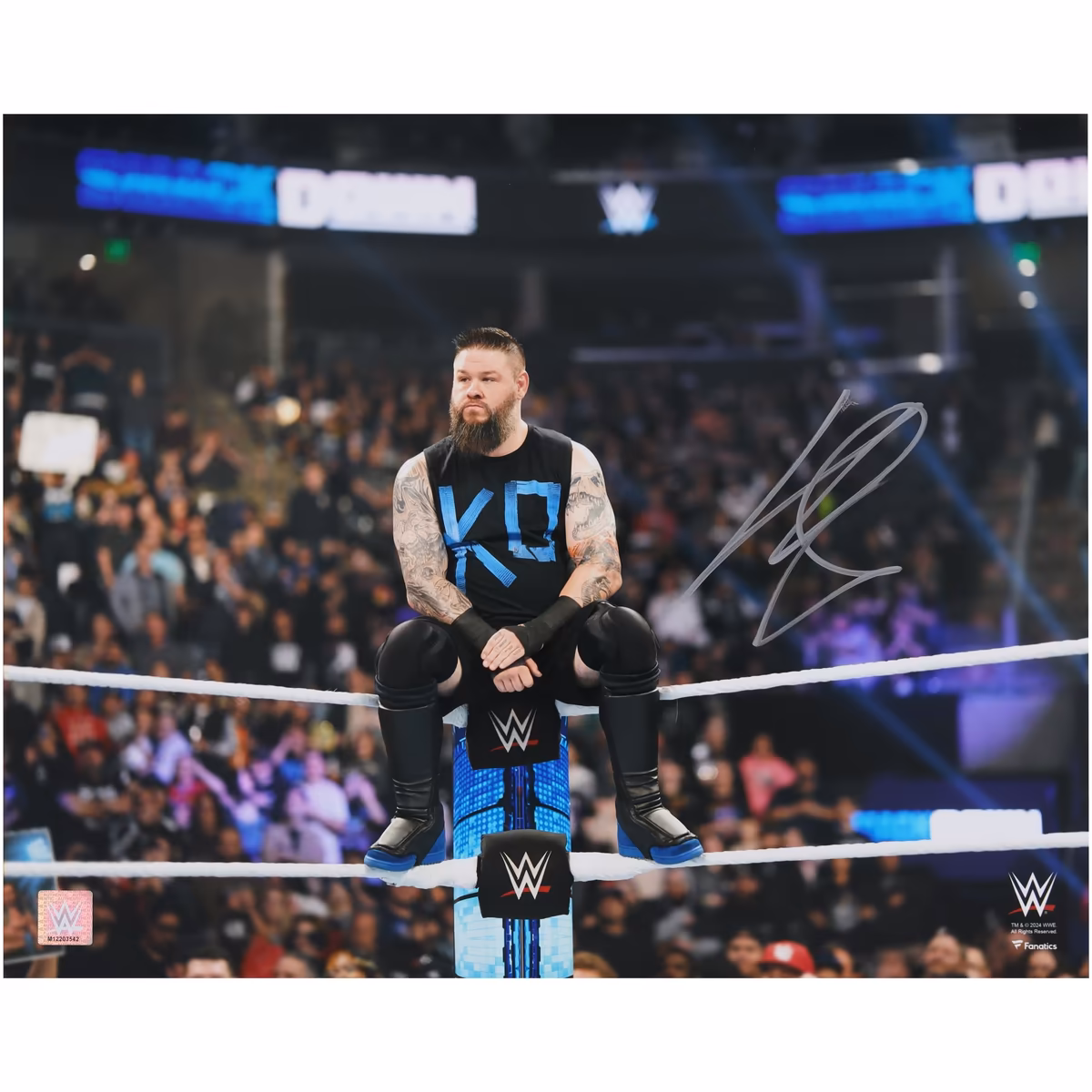 Kevin Owens WWE Autographed 16" x 20" Sitting on Turnbuckle Photograph