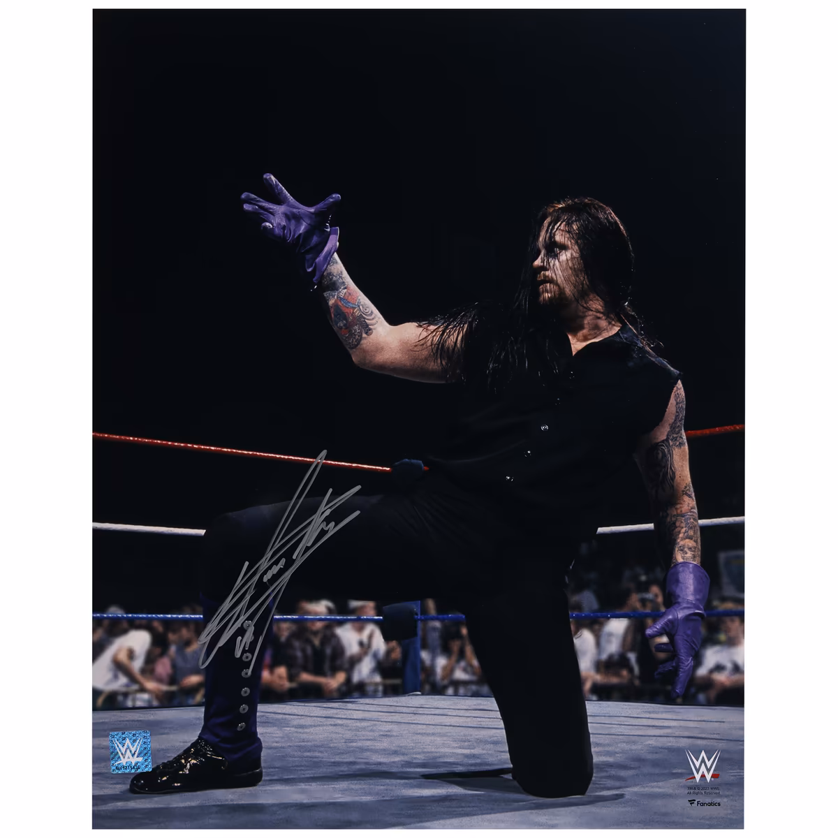 The Undertaker WWE Autographed 16" x 20" In Ring Kneeling Photograph
