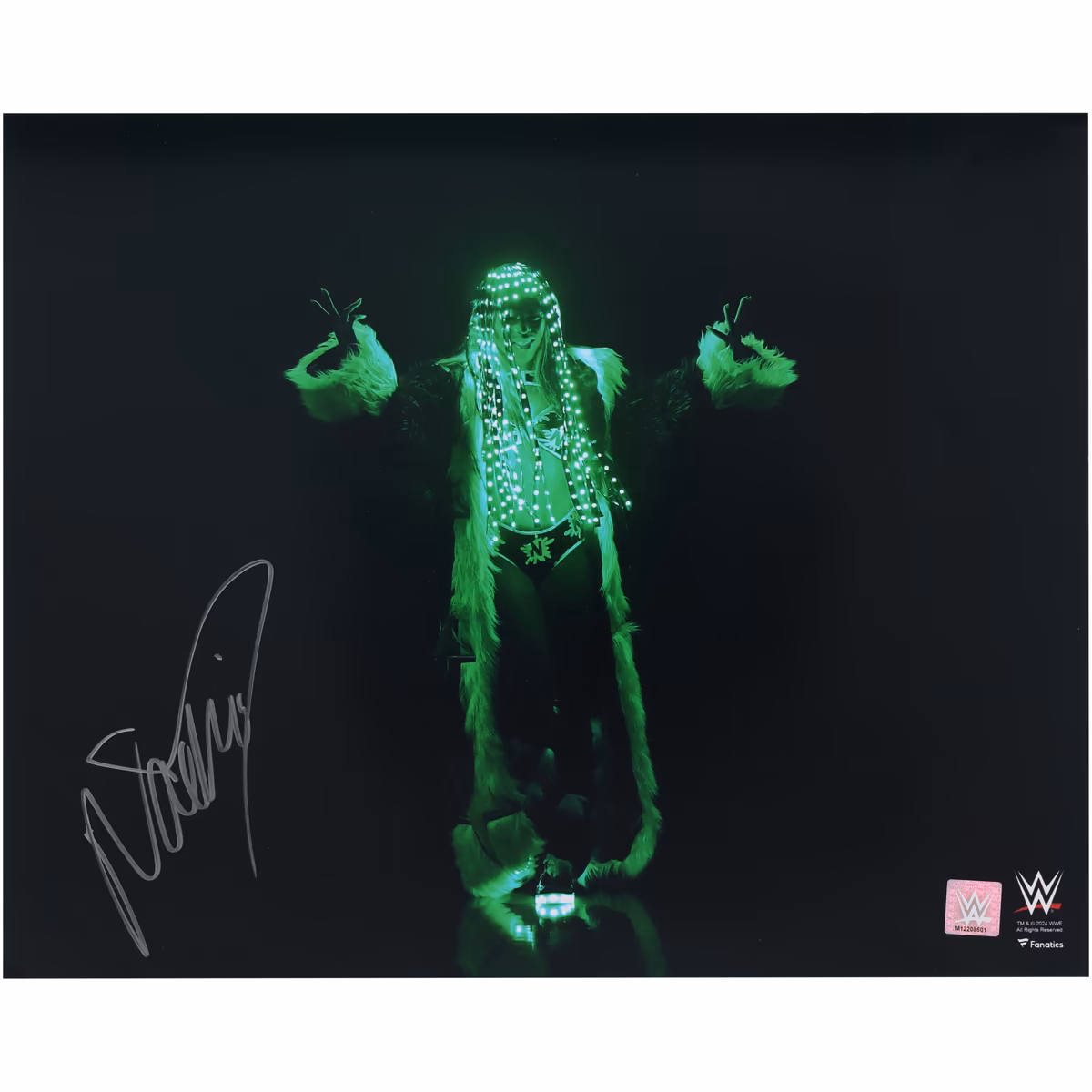 Naomi WWE Autographed 16" x 20" Green Glow Entrance Photograph 2 Naomi WWE Autographed 16" x 20" Green Glow Entrance Photograph