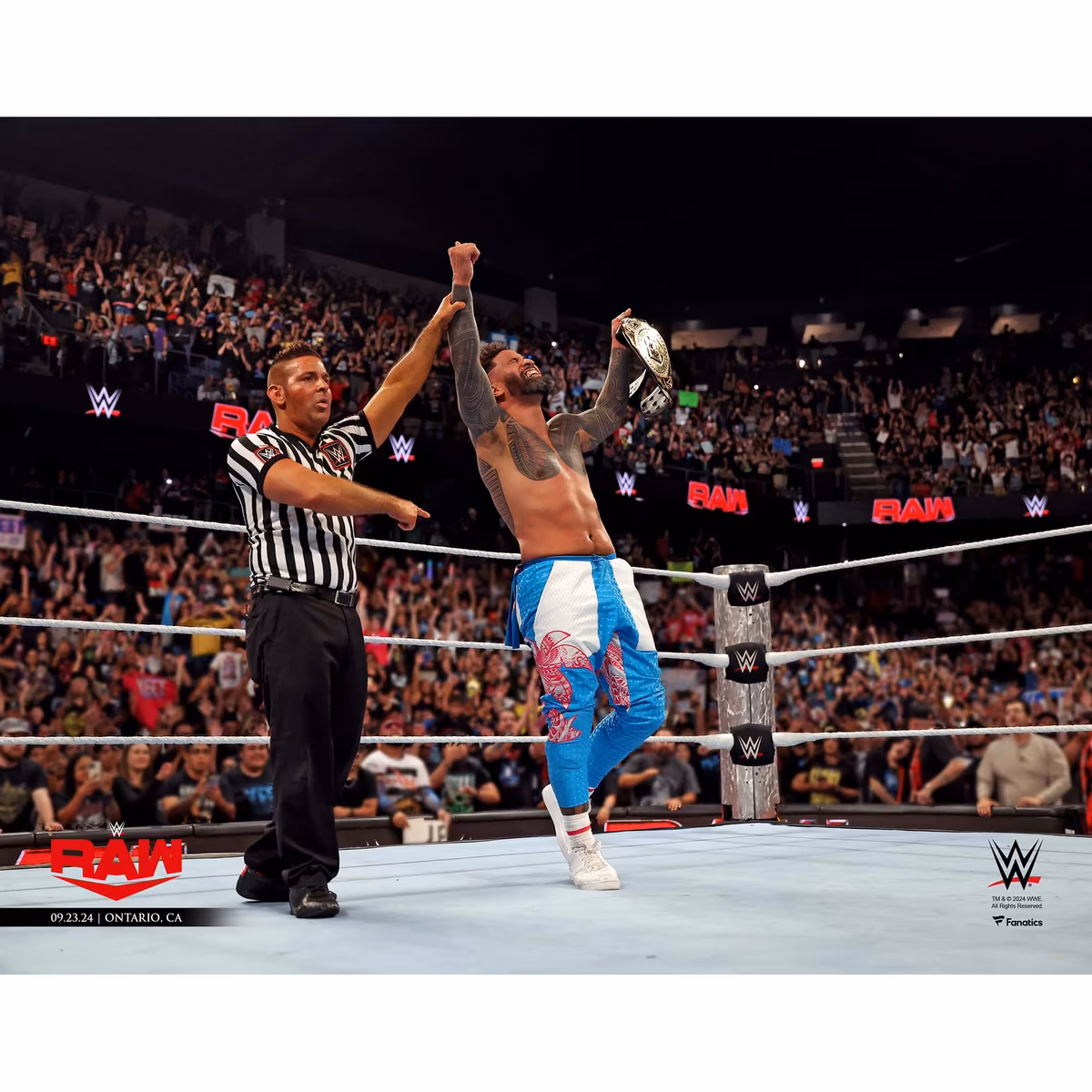 Jey Uso WWE Unsigned Raising Intercontinental Championship Photograph 8 Jey Uso WWE Unsigned Raising Intercontinental Championship Photograph