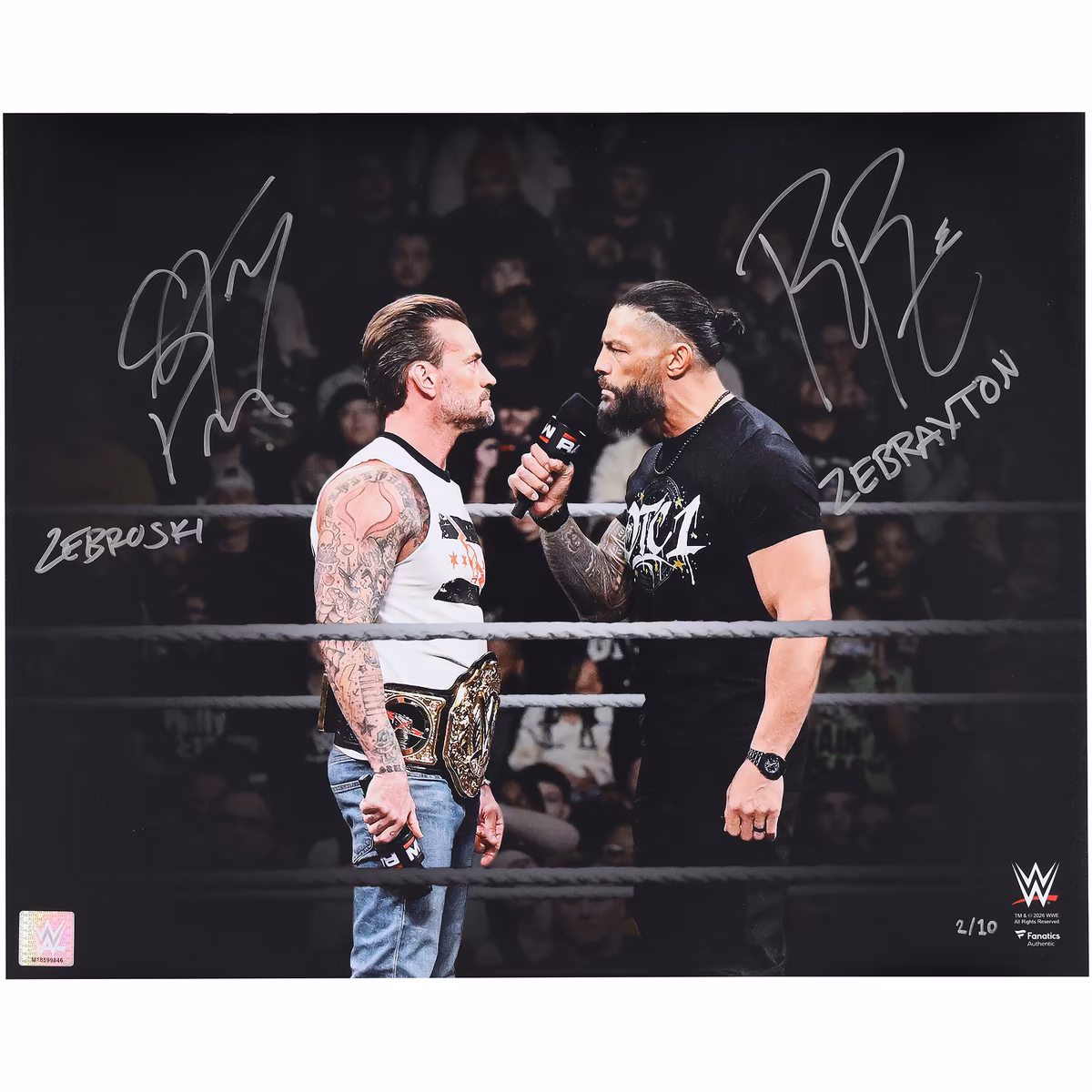 Roman Reigns & CM Punk WWE Autographed 16" x 20" In Ring Staredown Spotlight Photograph with Multiple Inscriptions - Limited Edition of 10