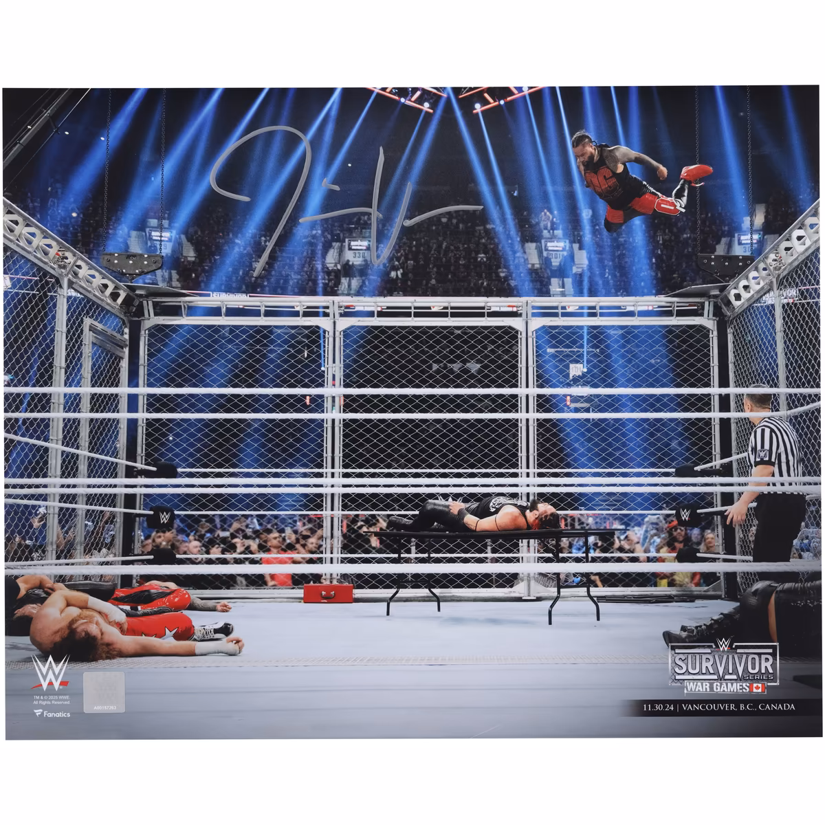 Jimmy Uso WWE Autographed 16" x 20" 2024 Survivor Series Jumping Off The Cage Photograph
