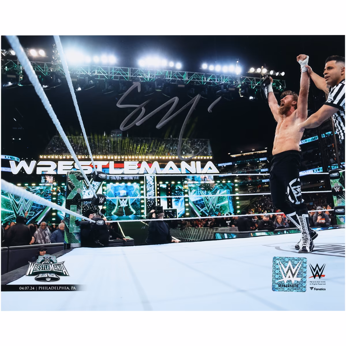 Sami Zayn WWE Autographed 8" x 10" WrestleMania XL Raising Title Belt Photograph