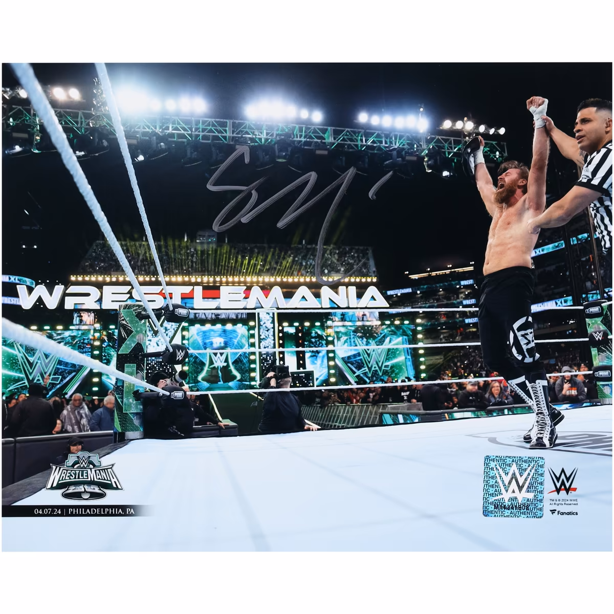 Sami Zayn WWE Autographed 8" x 10" WrestleMania XL Raising Title Belt Photograph