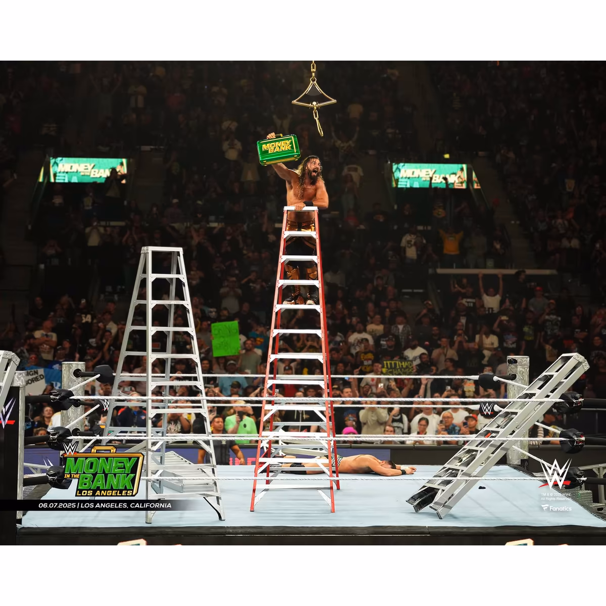 Seth Rollins WWE Unsigned 2025 Men's Money in the Bank Celebration Photograph 1 Seth Rollins WWE Unsigned 2025 Men's Money in the Bank Celebration Photograph